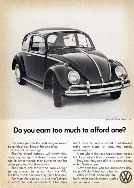 Kuplavolkkarin mainos jossa lukee "Do you earn too much to afford one?"