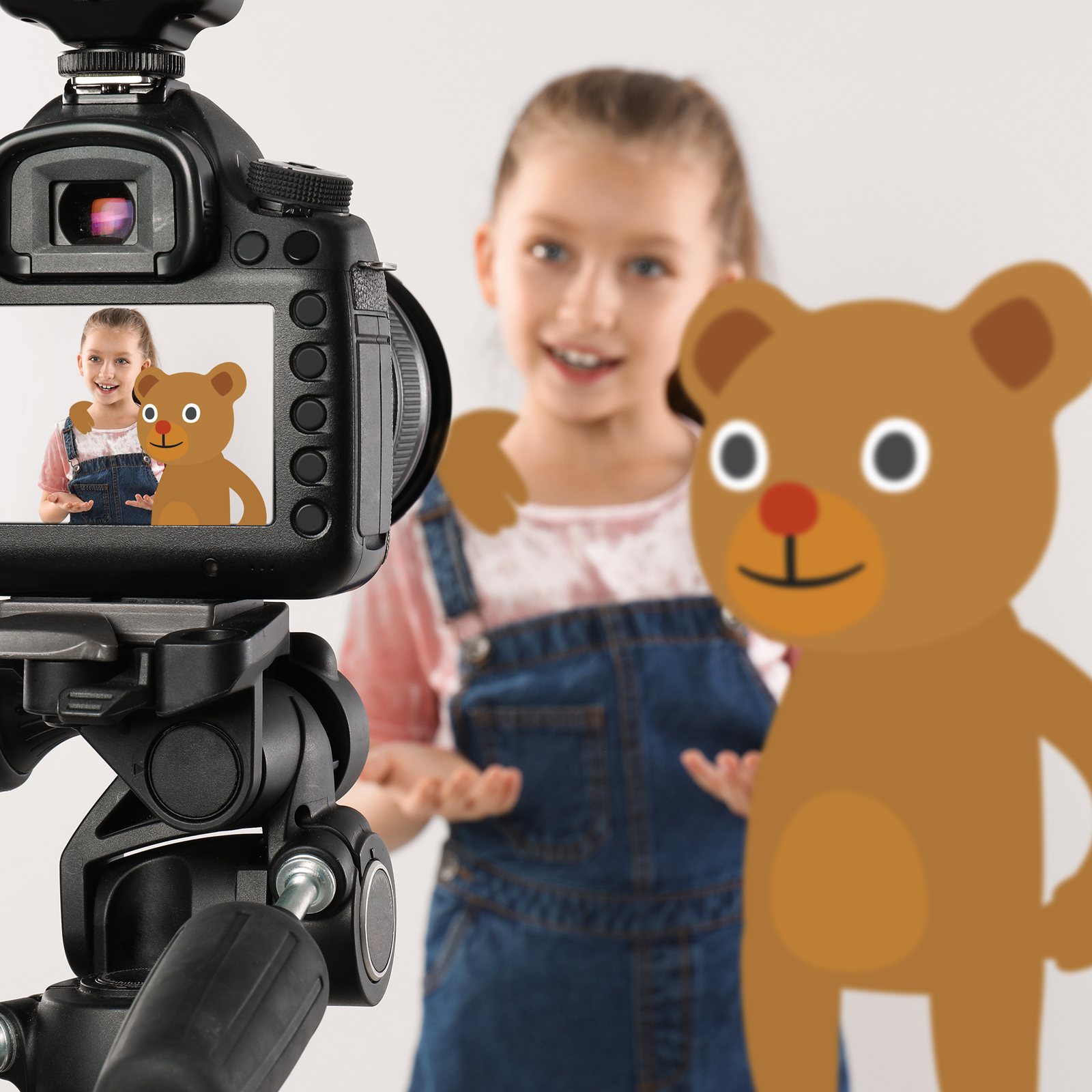 Lapsi puhuu studiossa kameralle, digitaalisesti tuotettu nalle vieressä.